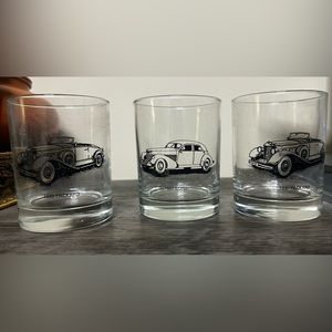 Set of three vintage classic car glasses.
